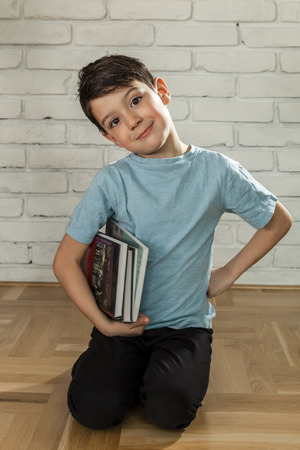 cute boy with books school educationの写真素材