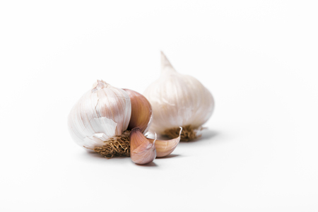 garlic isolated on white backgroundの写真素材