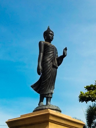 Buddha statue in walking posture at Saman Rattanaram Temple Wat Saman, Chachoengsao, Thailand.の素材