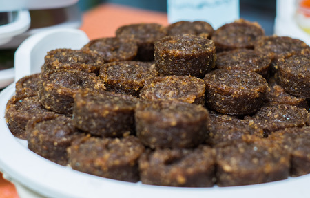 Thai dessert called "Kao Tu" or dried rice balls made from rice and coconut.の写真素材