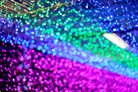 Defocused light of christmas and new year festival, abstract colorful bokeh.