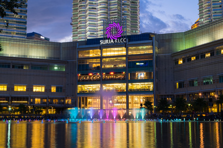 KUALA LUMPUR, MALAYSIA - FEBRUARY 29: Colorful fountain show with music in front of Suria KLCC Mall on February 29, 2016 in Kuala Lumpur, Malaysia. Suria KLCC is one of the premier shopping mall in Malaysia.のeditorial素材