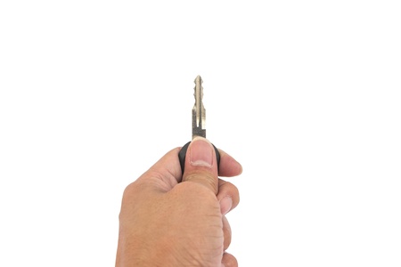 Left hand holding the keyの写真素材
