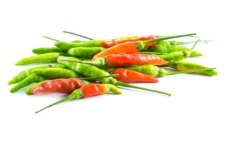 Red and green chili on white background の写真素材