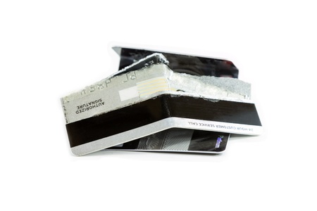 Damage credit cards on white background の写真素材