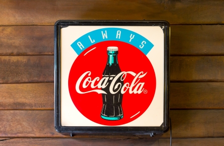 Suphanburi, Thailand-June 16: Light box coca-cola brand at old shop in Sam chuk market. Sam chuk, an old market town a community eating, shopping and charming place on June 16, 2013 in Suphanburi, Thailandのeditorial素材