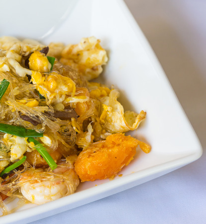 Vermicelli fried with vegetable, egg and shrimp closeup の写真素材