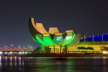 Marina Bay, Singapore - October 23, 2014: view of the ArtScience Museum at Marina Bay Sands, Singapore. ArtScience Museum is designed by Moshe Safdie. It become a famous tourist attractions in Singapore.のeditorial素材