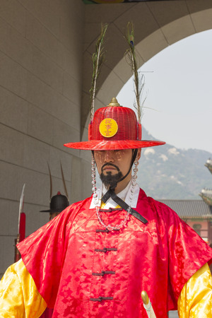 Seoul, South Korea - April 11, 2015: Koreans in Traditional Costumes on duty of the Royal Guard Ceremony at Gyeongbokgung Palaceのeditorial素材
