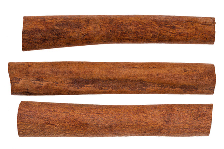 Cinnamon sticks isolated on white background, top view