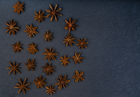 anise on a black background. Top view