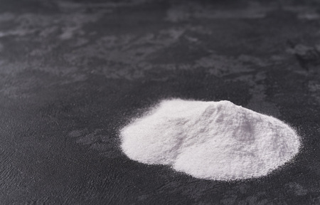 Baking soda on a black background.Selective focusの写真素材