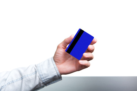 A man holding a bank card for payment.の写真素材