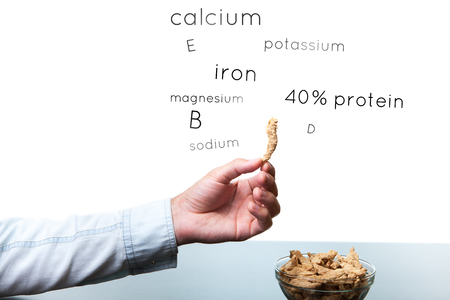 Three red ripe tomatoes on the table.の写真素材