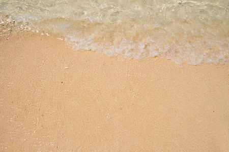 Soft wave of the sea on the sandy beachの写真素材