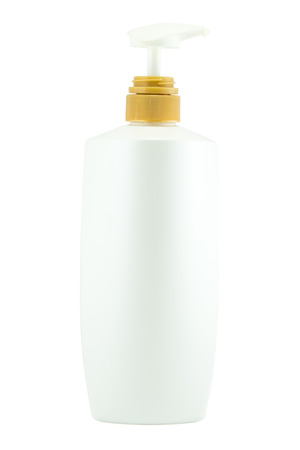 White plastic bottles for cosmetic creams, lotions, shampoo and gels with colored capsの写真素材