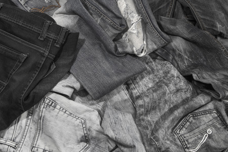 Jeans are beautifully detailed blue, dark blue and blackの写真素材