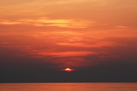 the sunrise at edge of the skyの写真素材