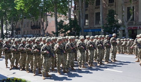 TBILISI - MAY 26: The Independence Day of Georgia. Soldiers getting ready for military parade. May 26, 2010 in Tbilisi, Georgia.のeditorial素材