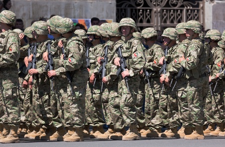 TBILISI - MAY 26: The Independence Day of Georgia. Soldiers getting ready for military parade. May 26, 2010 in Tbilisi, Georgia.のeditorial素材
