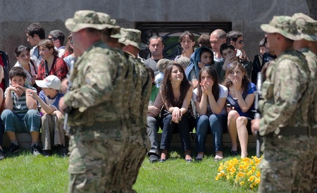 TBILISI - MAY 26: The Independence Day of Georgia. Spectators at the military parade. May 26, 2010 in Tbilisi, Georgia.のeditorial素材