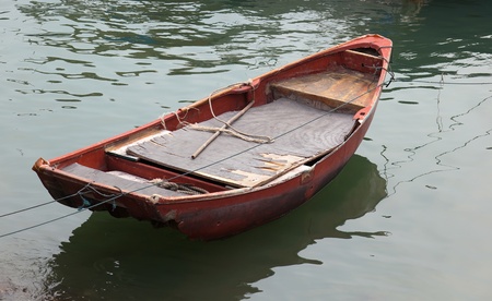Old moored dinghy. Cheung Chau. Hong Kong.の写真素材
