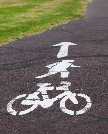 White bicycle track sign painted on the road. Melbourne. Australia.の写真素材
