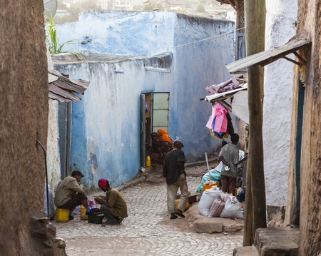 HARAR, ETHIOPIA - DECEMBER 23, 2013  Unidentified people of ancient walled city of Jugol in their daily routine activities that almost unchanged in more than four hundred years のeditorial素材