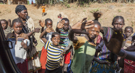 ARFAIDE (NEAR KARAT KONSO). ETHIOPIA - DECEMBER 26, 2013: Unidentified Ethiopian children in small village. Despite government efforts to fight poverty it is still widespread in Ethiopia.のeditorial素材