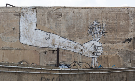 TEL AVIV - YAFO, ISRAEL - OCTOBER 19, 2014: Street art (graffiti) in the old Jaffa.のeditorial素材