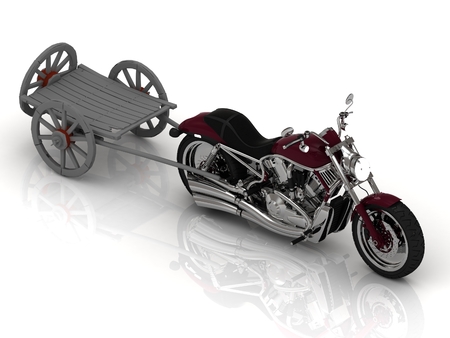Motorcycle carries varicoloured old wagon cart with wooden wheels isolated on white backgroundの写真素材