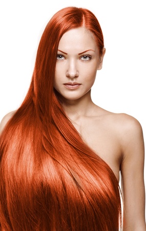 beautiful girl with beautiful long brown healthy shiny hairの写真素材