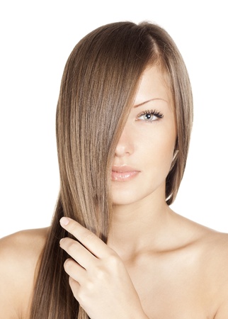 closeup portrait of a beautiful young woman with elegant long shiny hair , hairstyle , isolated on white backgroundの写真素材