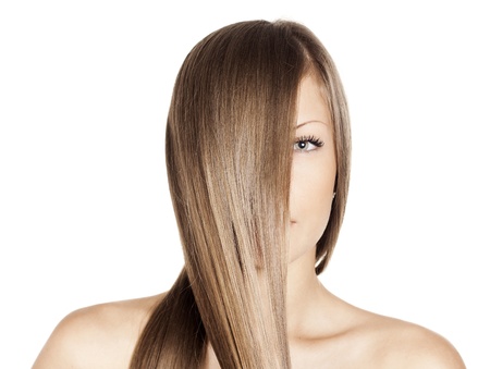 closeup portrait of a beautiful young woman with elegant long shiny hair , concept hairstyleの写真素材