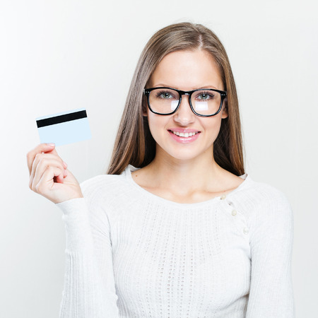 Young casual style woman portrait isolated over white backgroundの写真素材