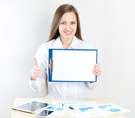 smiling business woman   office job   working at the officeの写真素材