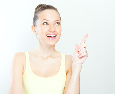 Young casual style woman portrait isolated over white backgroundの写真素材