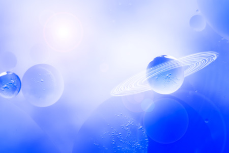 Planets on a blue and white background fantasy sceneの写真素材
