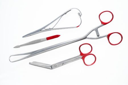 Diverse medical and surgery instruments isolated in whiteの写真素材
