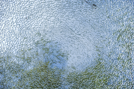 Very thick piece of glass broken, but only a crack, there is no real break anymore.の写真素材