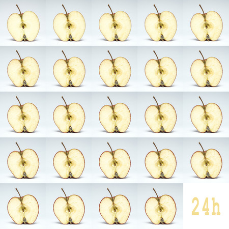 the decay of a fresh apple in 24 hours, aging conceptの写真素材