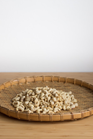 Cashew Nut wood background selective focusの写真素材