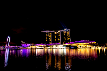 Singapore city at night with laser showのeditorial素材
