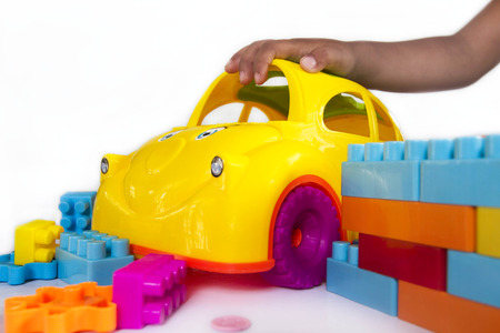 concept baby playing colorful plastic car toyの写真素材