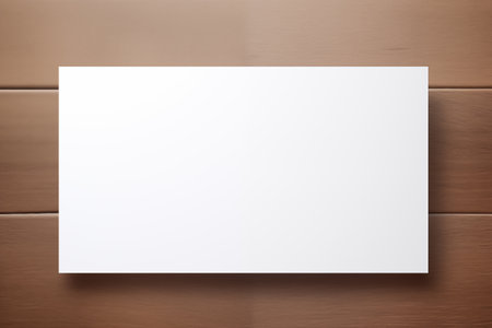 Blank white business card on wooden background. Mock up for designの素材