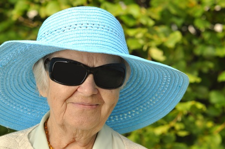 Senior woman in hat.の写真素材