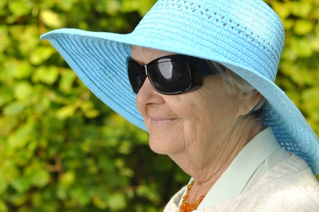 Senior woman in hat.の写真素材