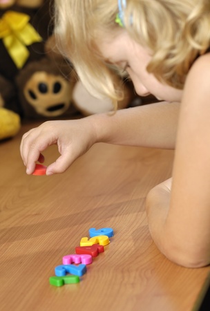 Little girl playing in her room.の写真素材