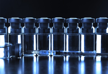 Vials of medications. Dark blue.の写真素材