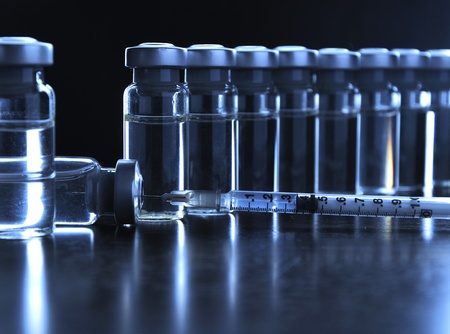 Vials of medications. Dark blue.の写真素材